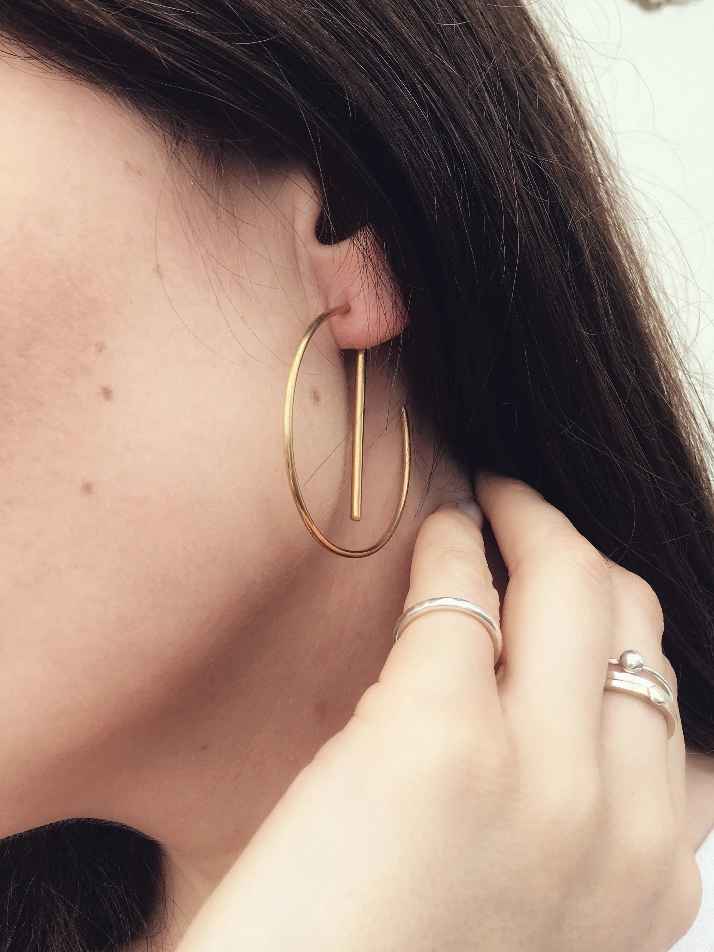 The Most Unlikely Places Small Jacket Hoops in Gold